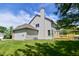 View of the home's siding and backyard at 8627 Lansdowne Dr, Fishers, IN 46038