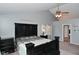Cozy primary bedroom with vaulted ceiling, neutral tones, and modern furnishings at 8627 Lansdowne Dr, Fishers, IN 46038