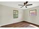 Inviting bedroom with hardwood floors, neutral color palette, and natural light at 8834 W 1050 S, Fortville, IN 46040