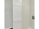 Hallway featuring a closet door, neutral color palette and modern lighting at 8834 W 1050 S, Fortville, IN 46040