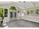 Sunroom featuring large windows that bring in plenty of natural light at 8834 W 1050 S, Fortville, IN 46040