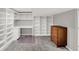 Finished basement with built-in shelves, desk and carpeting throughout at 9036 Buckeye Ct, Indianapolis, IN 46260