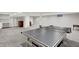 Large finished basement featuring recreation area, built-in storage, and carpeted floor at 9036 Buckeye Ct, Indianapolis, IN 46260