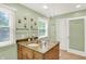 Bathroom with vanity and granite countertops and a large frameless mirror at 9036 Buckeye Ct, Indianapolis, IN 46260