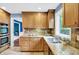 Well-appointed kitchen featuring granite countertops, stainless steel appliances, and ample cabinet space at 9036 Buckeye Ct, Indianapolis, IN 46260
