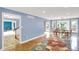 Open-concept home showcasing hardwood floors, dining area, and access to the upper level at 9036 Buckeye Ct, Indianapolis, IN 46260