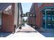 Charming alleyway featuring outdoor seating and decorative lighting and sign at 905 N Main St, Fortville, IN 46040