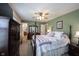 Primary bedroom with attached bath and sitting area at 905 N Main St, Fortville, IN 46040