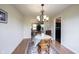 The dining area has a view of the kitchen and Gathering room, creating a seamless flow at 905 N Main St, Fortville, IN 46040