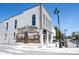 Corner shot of building with painted historic mural on exterior wall in shopping district at 905 N Main St, Fortville, IN 46040