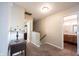 Upstairs hallway leading to bedroom and bathroom at 905 N Main St, Fortville, IN 46040