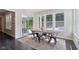 Bright dining room with large windows overlooking outdoor pool at 9155 Kerwood Dr, Indianapolis, IN 46240