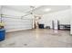 Spacious and well-lit garage with ample room for vehicles, storage, and organization at 9155 Kerwood Dr, Indianapolis, IN 46240