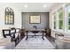 Stylish home office with a dark accent wall, modern furniture, and plenty of natural light at 9155 Kerwood Dr, Indianapolis, IN 46240