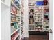 Well-organized pantry shelving showcases food items, appliances, dishes, and small storage containers at 9155 Kerwood Dr, Indianapolis, IN 46240