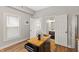 The kitchen has a wood countertop island and an open design that offers easy access to the bathroom at 921 S State Ave, Indianapolis, IN 46203