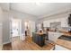 Spacious kitchen showcasing a black kitchen island, wood countertops, and open access to the home's entryway at 921 S State Ave, Indianapolis, IN 46203