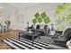 Stylish living room featuring contemporary decor, modern furniture, and ample natural light at 921 S State Ave, Indianapolis, IN 46203