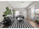 Stylish living room featuring contemporary decor, modern furniture, and ample natural light at 921 S State Ave, Indianapolis, IN 46203