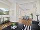 Open-concept living area with hardwood floors, neutral color palette, and modern furnishings at 921 S State Ave, Indianapolis, IN 46203