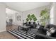 Comfortable living room featuring stylish furniture, decorative accents, and an open layout at 921 S State Ave, Indianapolis, IN 46203