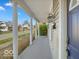 Spacious porch featuring classic columns and providing a serene outdoor space at 921 S State Ave, Indianapolis, IN 46203
