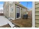 View of the back entrance and an AC unit on a concrete pad, highlighting practical aspects of the property at 923 S State Ave, Indianapolis, IN 46203
