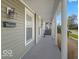 Classic porch with white columns, mailbox, and lighting fixture, perfect for enjoying the outdoors at 923 S State Ave, Indianapolis, IN 46203
