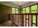 Balcony view of brick wall and green trees at 9387 Sullivan Pl, Zionsville, IN 46077