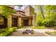 Inviting entrance with stone accents and decorative rock garden at 9387 Sullivan Pl, Zionsville, IN 46077