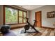 Light filled workout room featuring an exercise bike and yoga equipment at 9387 Sullivan Pl, Zionsville, IN 46077