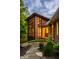 Modern home with large windows offering natural light and a view of the surrounding greenery at 9387 Sullivan Pl, Zionsville, IN 46077