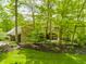 Exterior shot showcasing lush greenery and a partial view of the home at 9387 Sullivan Pl, Zionsville, IN 46077