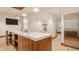 Bright kitchen with modern appliances, light wood cabinets and large island for eating and food prep at 9387 Sullivan Pl, Zionsville, IN 46077