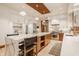 Modern kitchen with an oversized island, stainless appliances, and beautiful natural lighting at 9387 Sullivan Pl, Zionsville, IN 46077