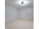 Finished basement featuring neutral carpeting, modern light fixture, and neutral colored walls at 9493 Timber View Dr, Indianapolis, IN 46250