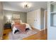Cozy bedroom featuring hardwood floors, closet space and neutral decor at 9493 Timber View Dr, Indianapolis, IN 46250