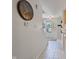 Open hallway with tile floors leads to the front door and staircase at 9493 Timber View Dr, Indianapolis, IN 46250