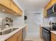 Bright kitchen with white quartz countertops, stainless steel appliances and eat in breakfast bar at 9493 Timber View Dr, Indianapolis, IN 46250