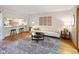 Spacious living room with hardwood floors, modern decor and great natural light at 9493 Timber View Dr, Indianapolis, IN 46250