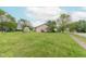 Expansive backyard with lush green grass offers ample space for outdoor activities at 980 Red Maple Ct, Greenwood, IN 46143