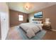 Inviting bedroom with a comfortable bed, natural light, and soothing decor at 980 Red Maple Ct, Greenwood, IN 46143