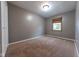 Simple bedroom with a small window, neutral paint, carpet and a closet at 980 Red Maple Ct, Greenwood, IN 46143