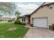 Charming single-story home with attached garage, well-maintained lawn, and inviting curb appeal at 980 Red Maple Ct, Greenwood, IN 46143