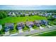 An aerial view capturing the neighborhood's layout, showcasing well-maintained homes and green spaces at 9823 Pica Dr, Fishers, IN 46040