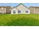 Expansive backyard featuring a lush lawn, perfect for outdoor activities and relaxation at 9823 Pica Dr, Fishers, IN 46040