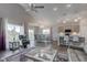 Open-concept living space flows seamlessly into dining and kitchen areas at 9823 Pica Dr, Fishers, IN 46040