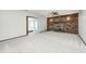 Spacious finished basement features new carpet, brick fireplace, and adjacent room at 101 N Westbury Rd, Pendleton, IN 46064
