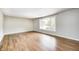 Bright living room with hardwood floors and large window offering ample natural light at 101 N Westbury Rd, Pendleton, IN 46064