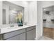 Stylish bathroom with double sinks, quartz countertop, and a closet nearby at 1067 Marston Ln, Avon, IN 46123